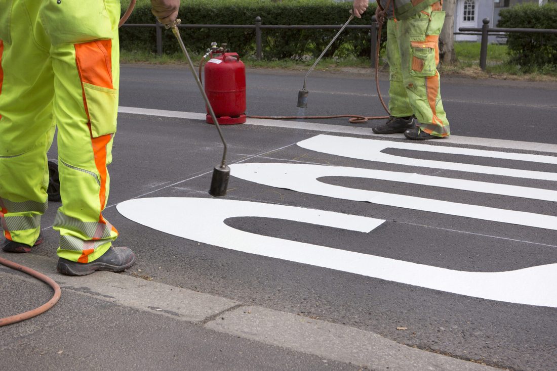 Road line marking crew using LPG-fuelled equipment - FloGas LPG for businesses from North East Bottled Gas