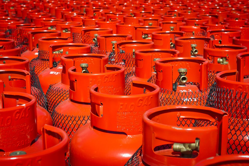 Rows of red FloGas propane gas cylinders